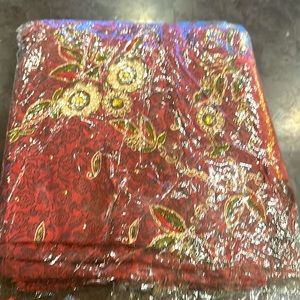 Beautiful embroidered rust color suit fabric with dupatta.